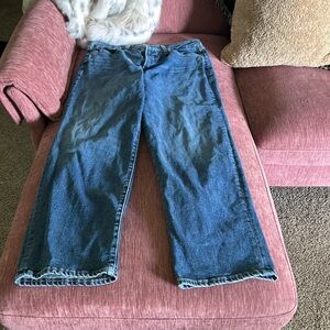 Low Rise Dark Wash Denim Bootcut Jeans. Stretchy Fit.
